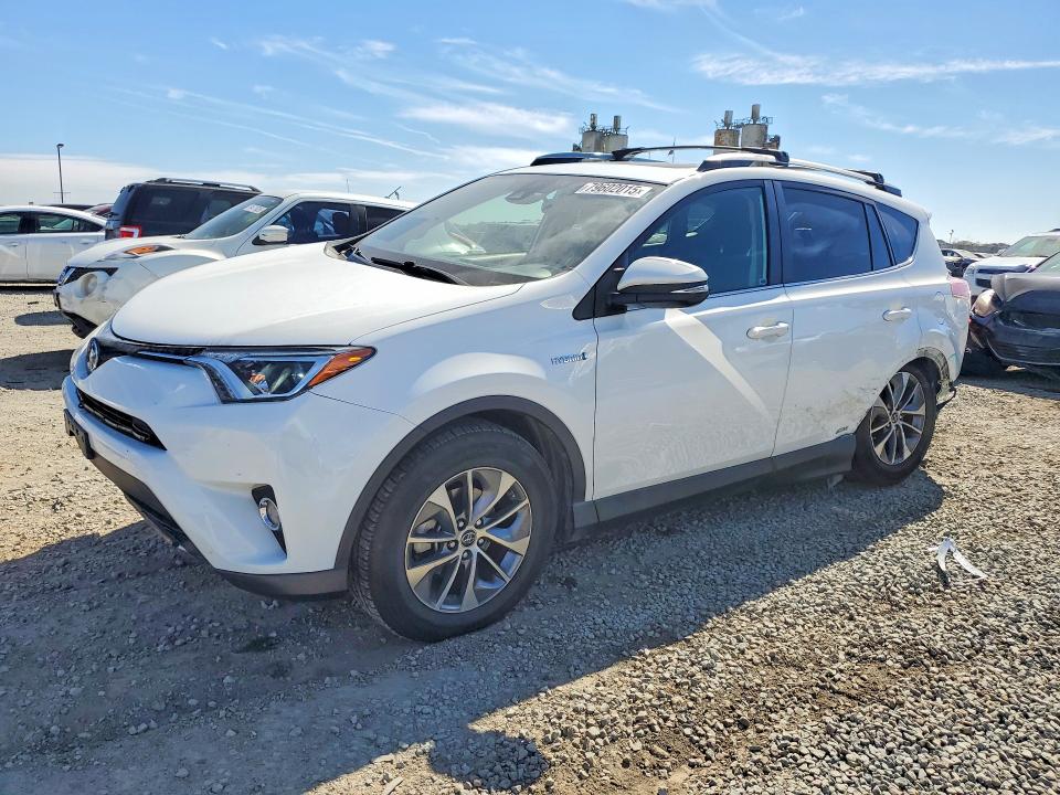 2018 TOYOTA RAV4 HYBRID — VIN JTMRJREV9JD165570
