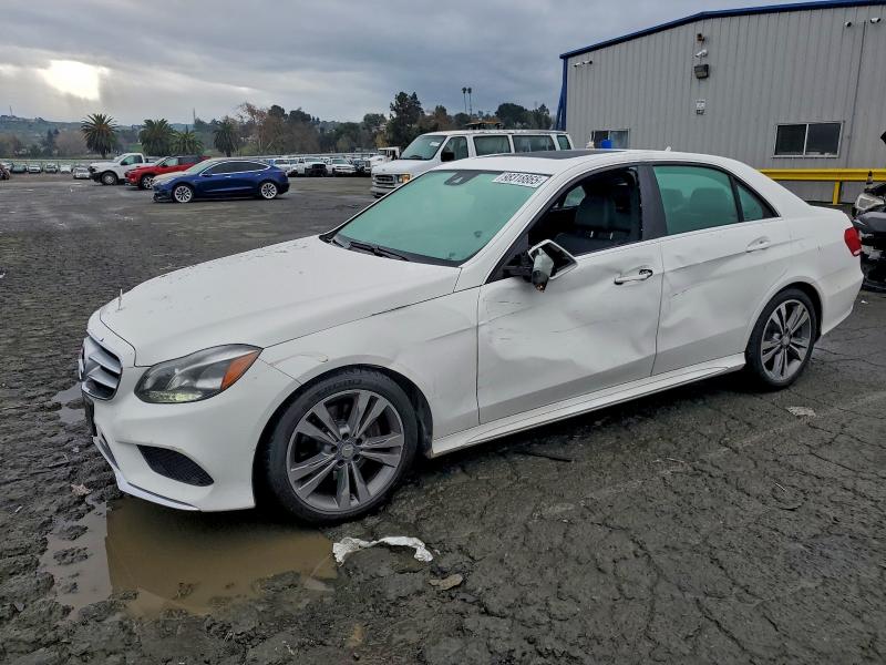 2014 MERCEDES-BENZ E 350 — VIN WDDHF5KB0EA999000