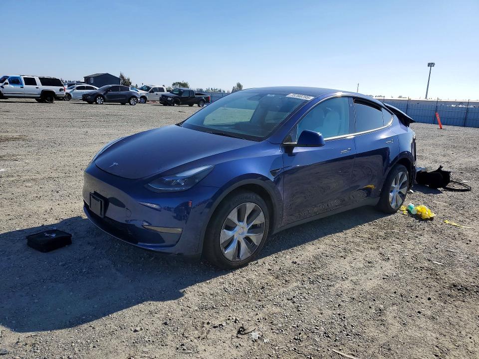 2023 TESLA MODEL Y — VIN 7SAYGDEE9PF631421