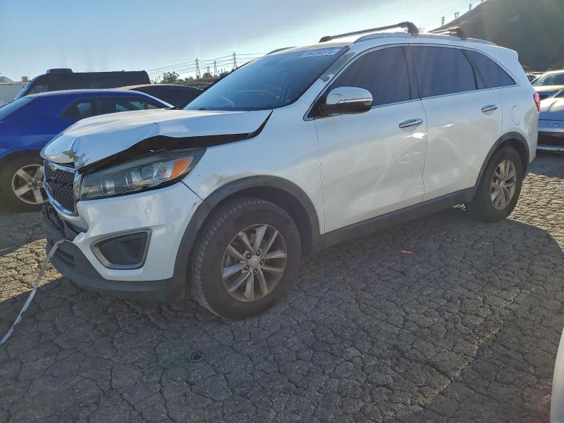 2016 KIA SORENTO LX — VIN 5XYPG4A33GG052544