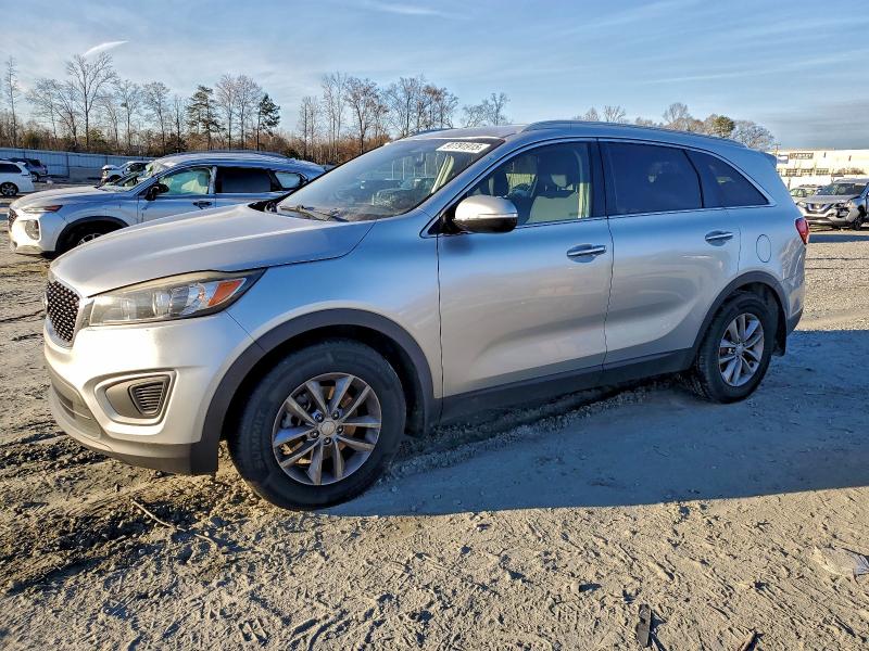 2016 KIA SORENTO LX — VIN 5XYPG4A37GG033947