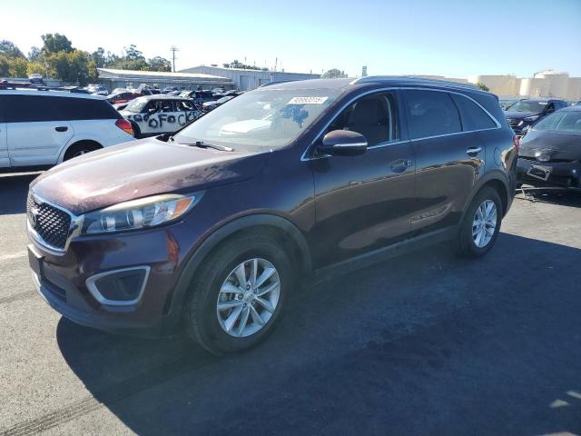 2016 KIA SORENTO LX — VIN 5XYPG4A51GG027093