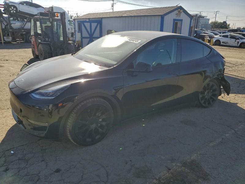 2022 TESLA MODEL Y — VIN 7SAYGDEE0NF575477
