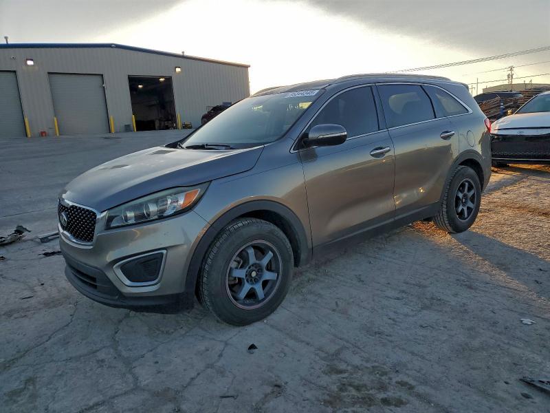 2016 KIA SORENTO LX — VIN 5XYPG4A32GG028008