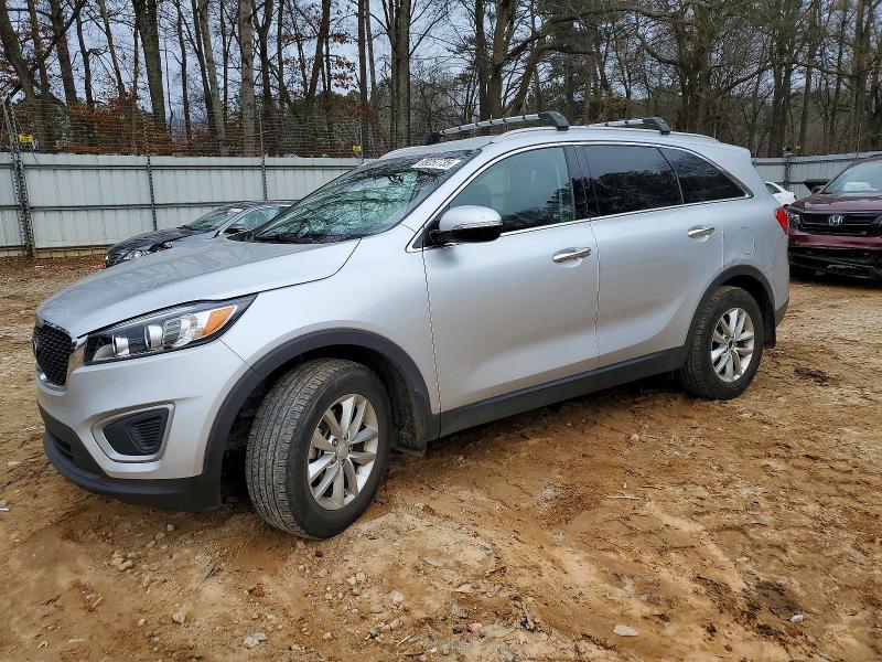 2016 KIA SORENTO LX — VIN 5XYPG4A36GG170670