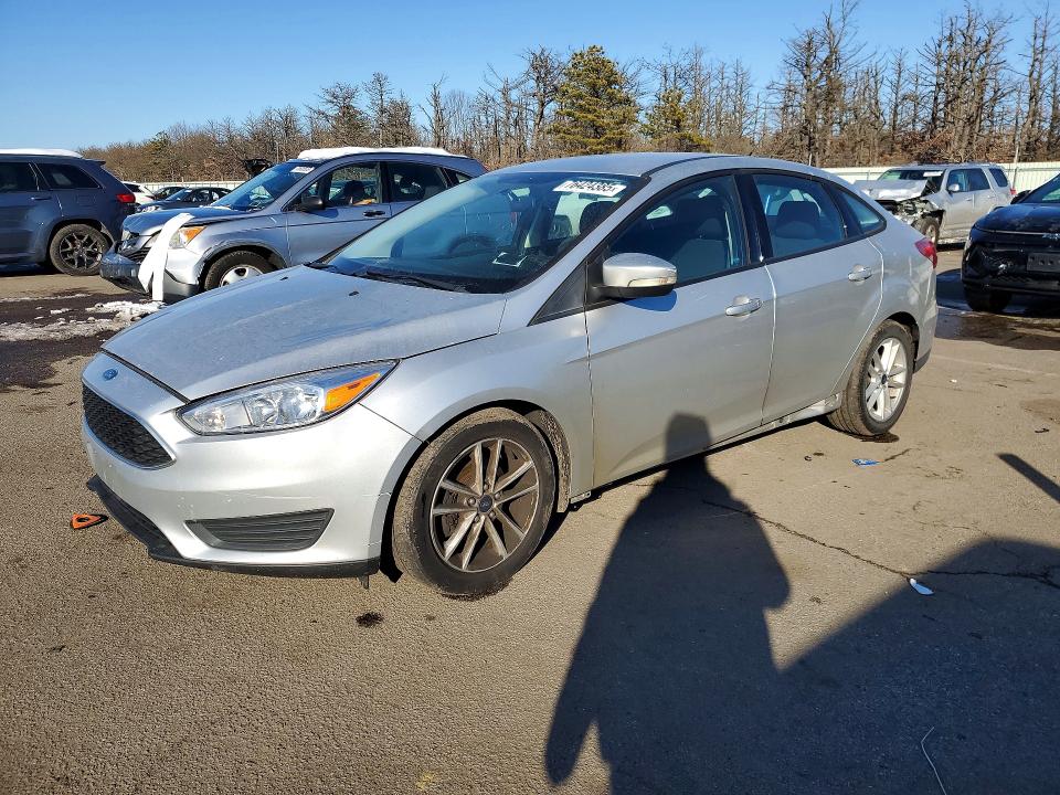 2016 FORD FOCUS SE — VIN 1FADP3F29GL384916