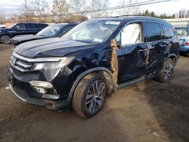 2016 HONDA PILOT TOUR — VIN 5FNYF6H94GB097187
