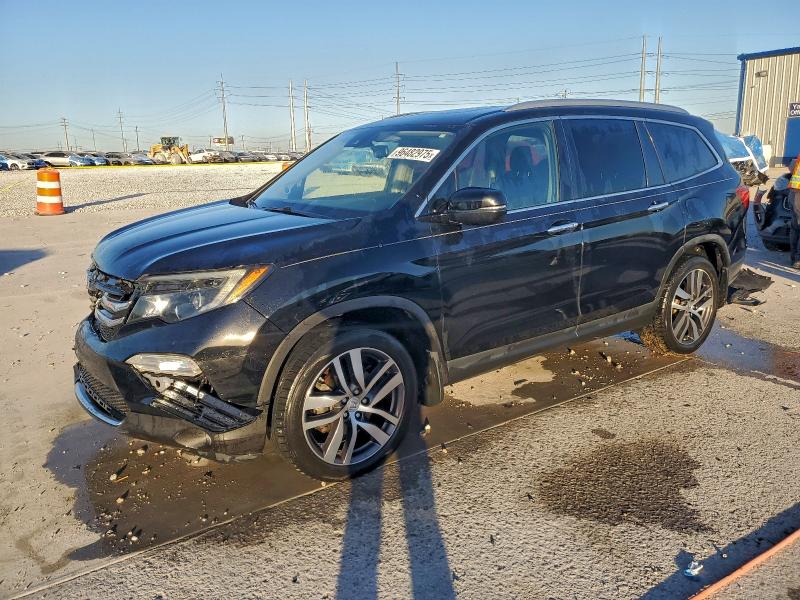 2017 HONDA PILOT TOUR — VIN 5FNYF5H97HB046701