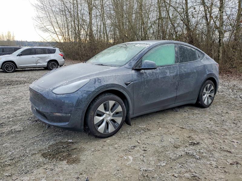 2023 TESLA MODEL Y — VIN 7SAYGAEE1PF885669
