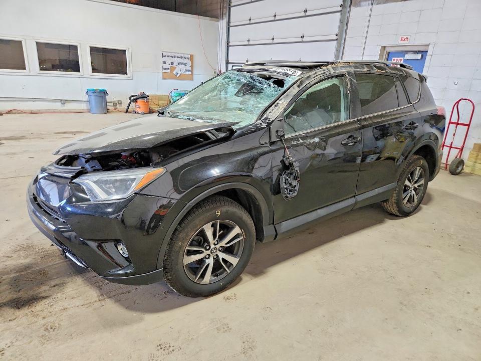 2018 TOYOTA RAV4 — VIN 2T3RFREV2JW711484