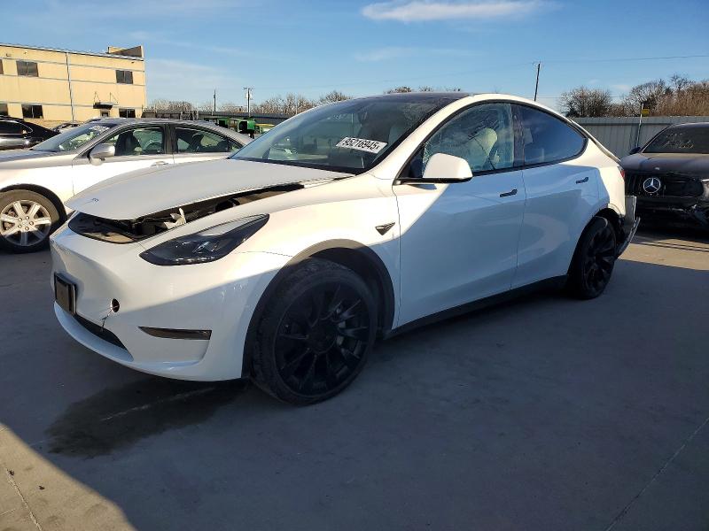 2023 TESLA MODEL Y — VIN 7SAYGAEE6PF644884