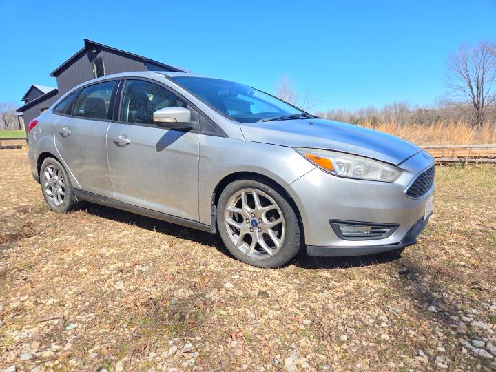 2015 FORD FOCUS — VIN 1FADP3F24FL234288