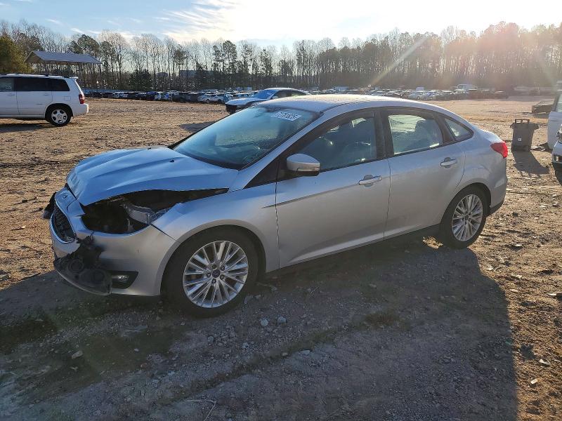 2016 FORD FOCUS SE — VIN 1FADP3F27GL298214