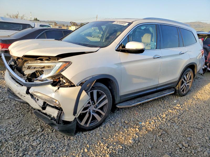 2017 HONDA PILOT TOUR — VIN 5FNYF6H9XHB016095