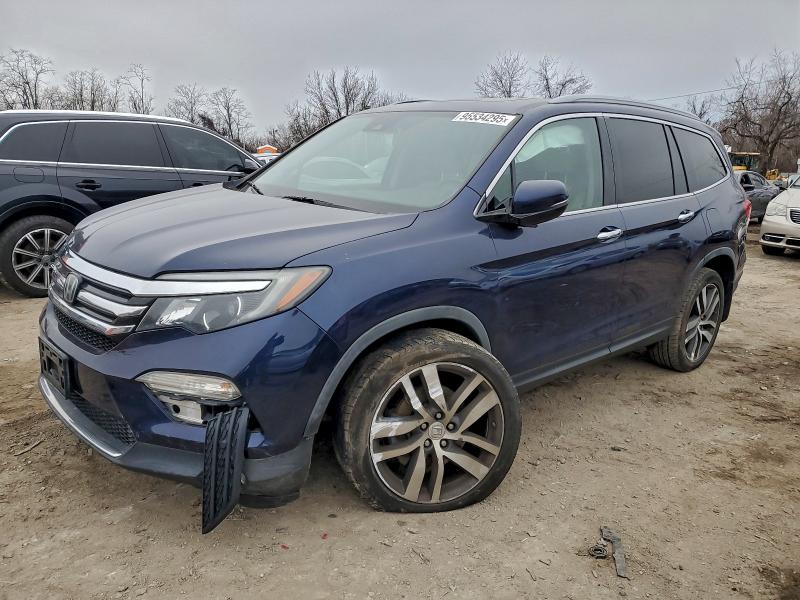 2017 HONDA PILOT TOUR — VIN 5FNYF5H96HB045202