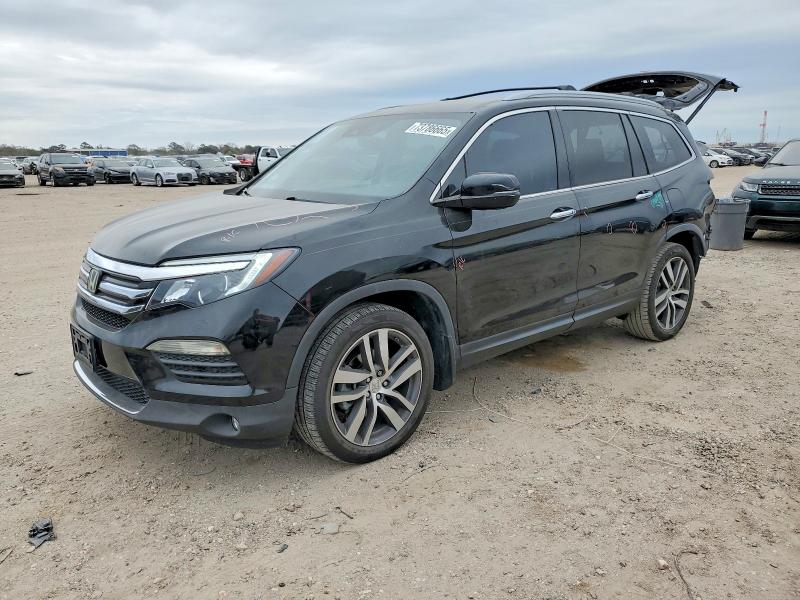 2016 HONDA PILOT TOUR — VIN 5FNYF5H92GB046751