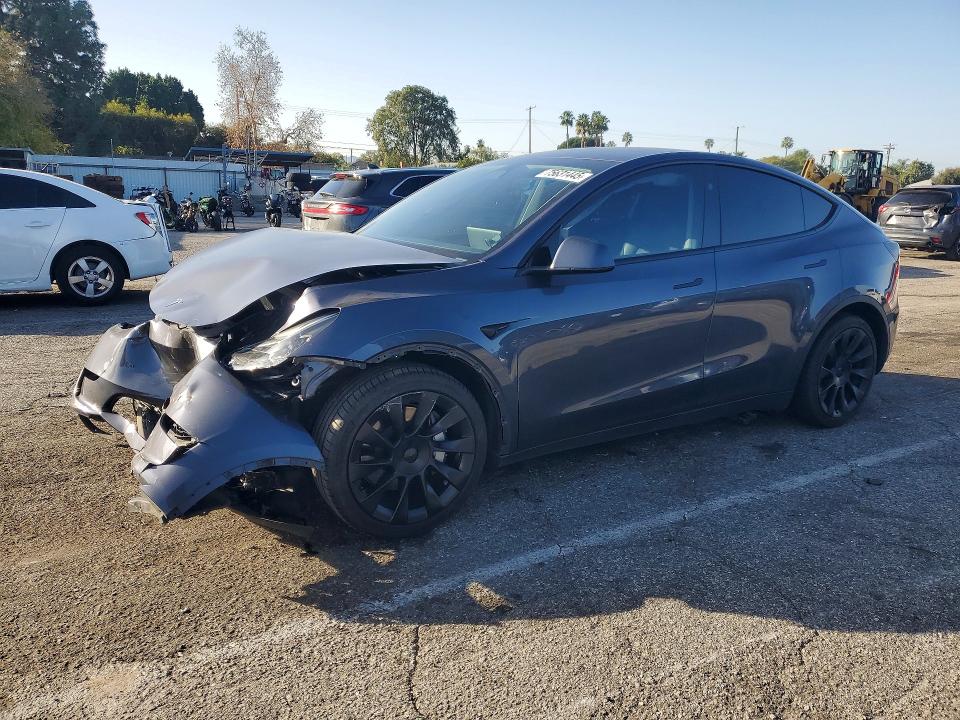 2023 TESLA MODEL Y — VIN 7SAYGDEE1PF907381