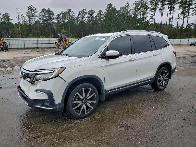 2021 HONDA PILOT TOUR — VIN 5FNYF5H64MB012571
