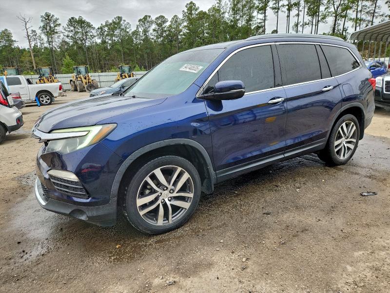 2017 HONDA PILOT TOUR — VIN 5FNYF5H91HB004220