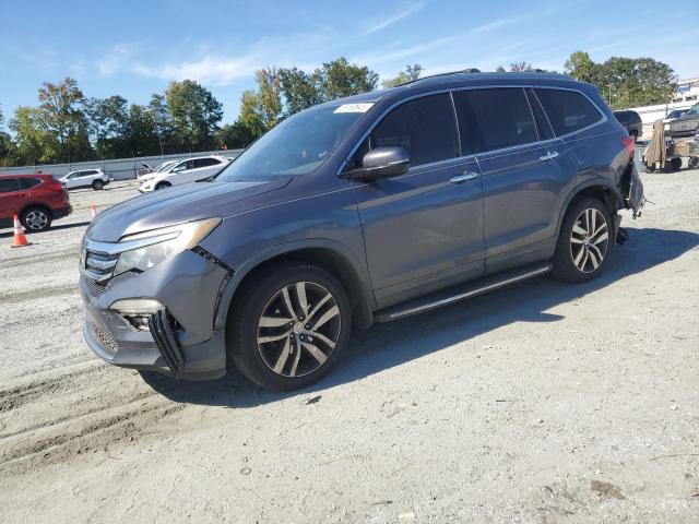 2016 HONDA PILOT TOURING — VIN 5FNYF5H92GB001650