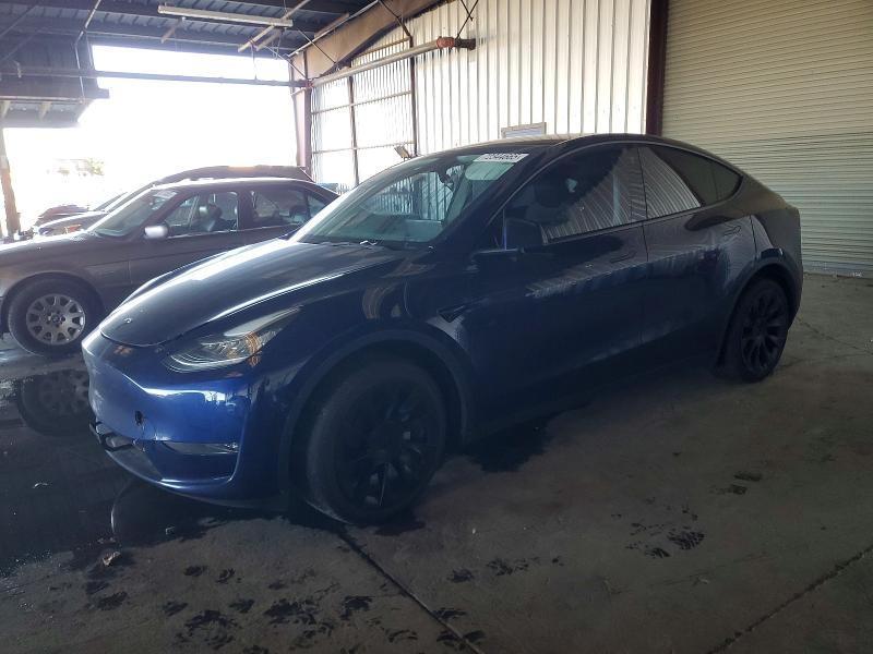 2023 TESLA MODEL Y — VIN 7SAYGDEE5PA099100