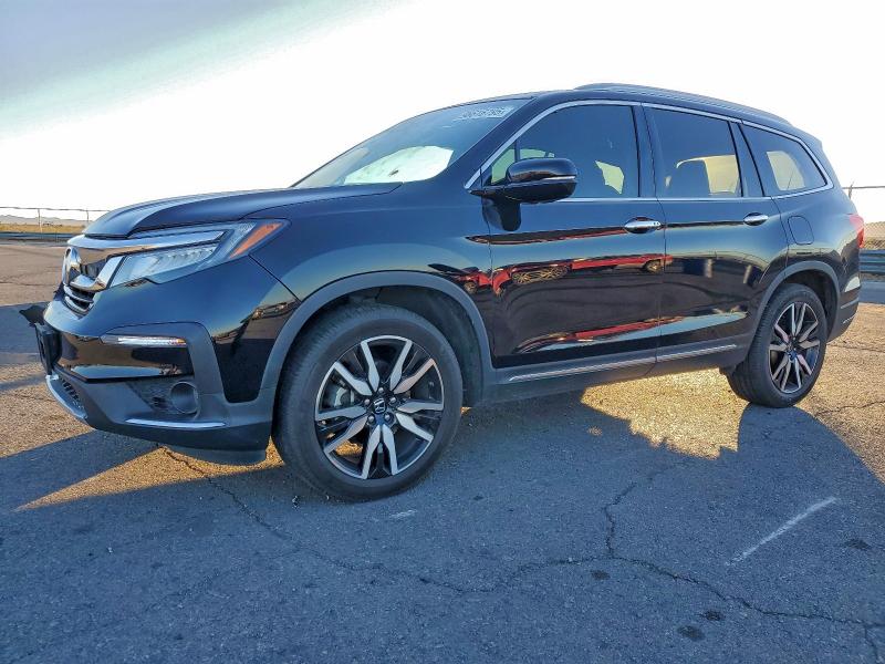 2020 HONDA PILOT TOUR — VIN 5FNYF5H63LB009529