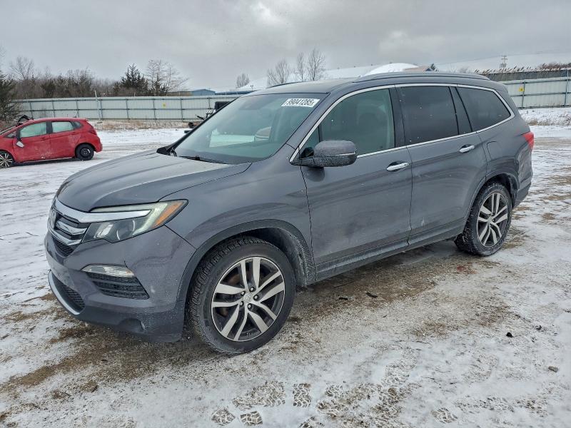 2017 HONDA PILOT TOUR — VIN 5FNYF6H98HB021070