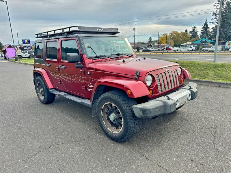 2011 JEEP WRANGLER U — VIN 1J4BA5H17BL593450