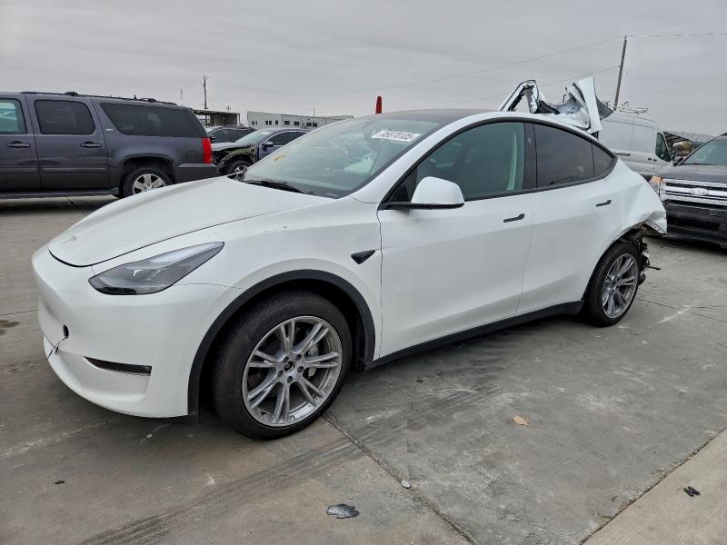 2023 TESLA MODEL Y — VIN 7SAYGAEE2PF950125