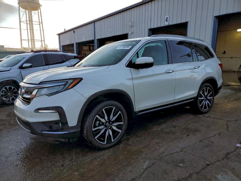 2019 HONDA PILOT TOUR — VIN 5FNYF6H65KB028409