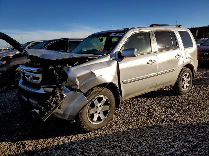 2010 HONDA PILOT TOUR — VIN 5FNYF4H92AB026372