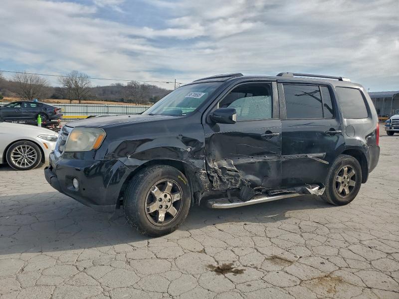 2011 HONDA PILOT TOUR — VIN 5FNYF3H99BB047408