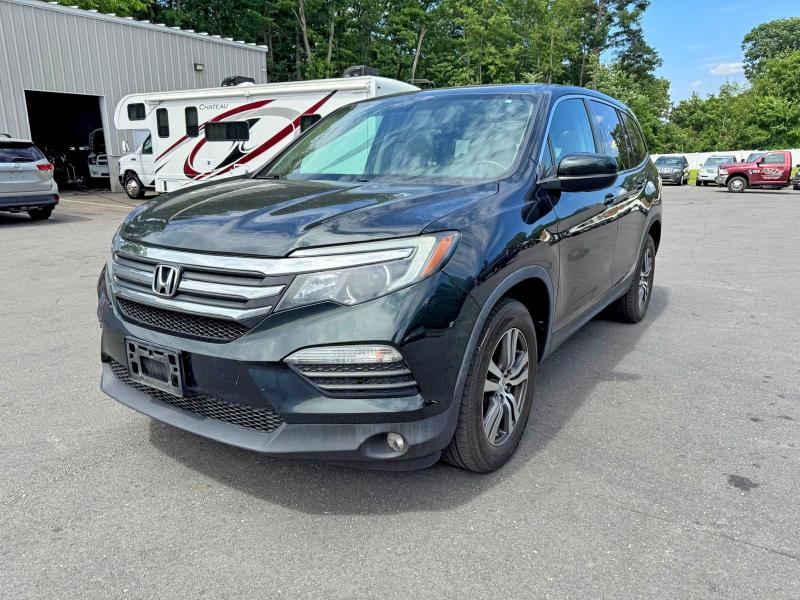 5FNYF6H57JB012590