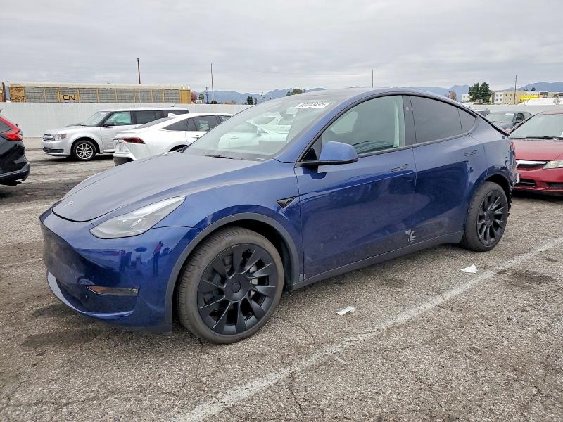 2024 TESLA MODEL Y — VIN 7SAYGAEEXRF008875