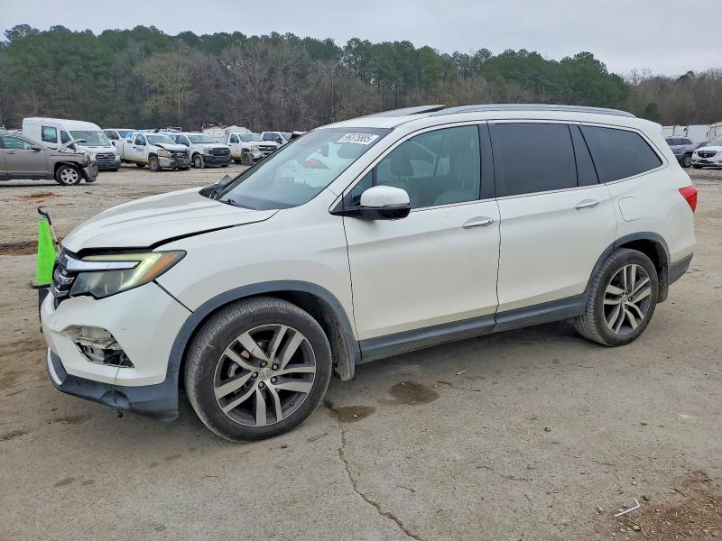 2016 HONDA PILOT TOUR — VIN 5FNYF5H93GB019090