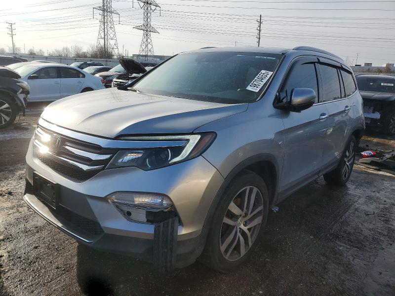 2016 HONDA PILOT TOUR — VIN 5FNYF6H90GB063134