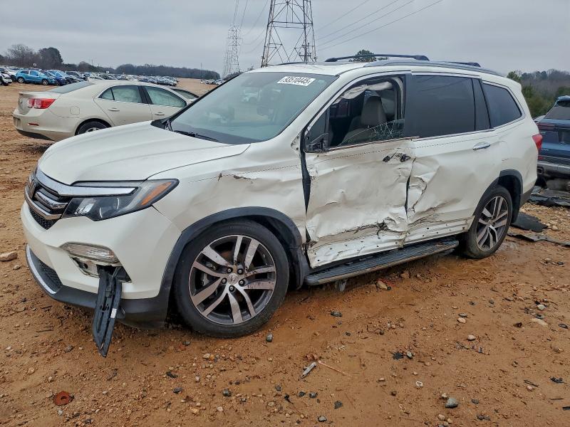 2017 HONDA PILOT ELIT — VIN 5FNYF6H05HB100018