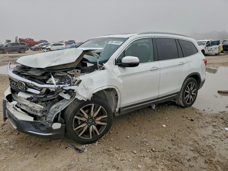 2020 HONDA PILOT TOUR — VIN 5FNYF5H60LB009598