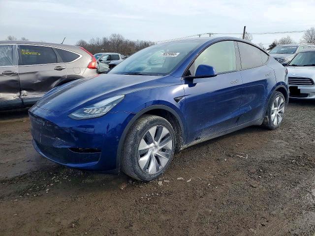 2023 TESLA MODEL Y — VIN 7SAYGDEE0PA102551