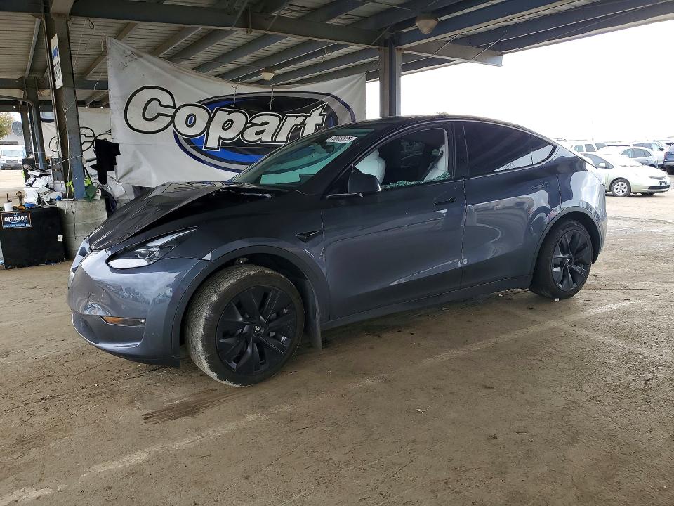 2023 TESLA MODEL Y — VIN 7SAYGAEE9PF871552