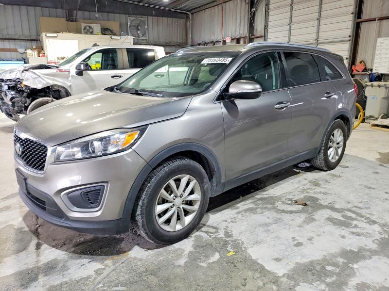 2016 KIA SORENTO LX — VIN 5XYPG4A59GG110464
