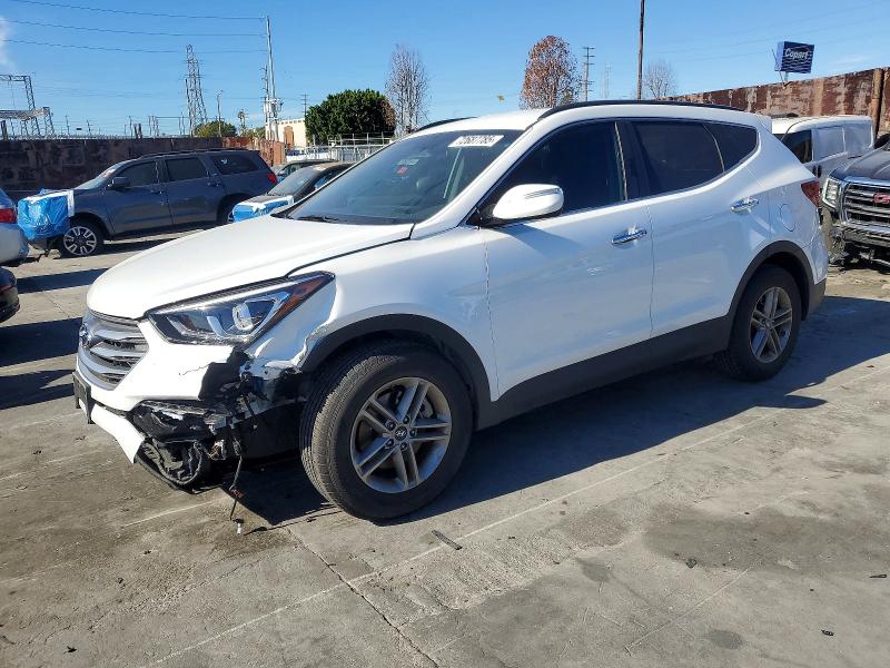 2018 HYUNDAI SANTA FE S — VIN 5XYZU3LBXJG531261