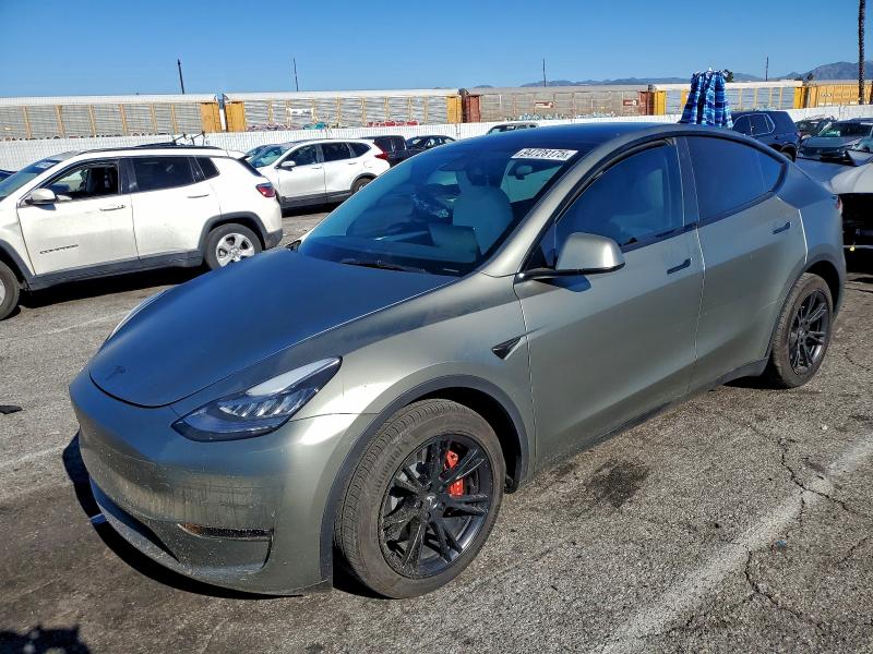 2023 TESLA MODEL Y — VIN 7SAYGDEE2PF615304