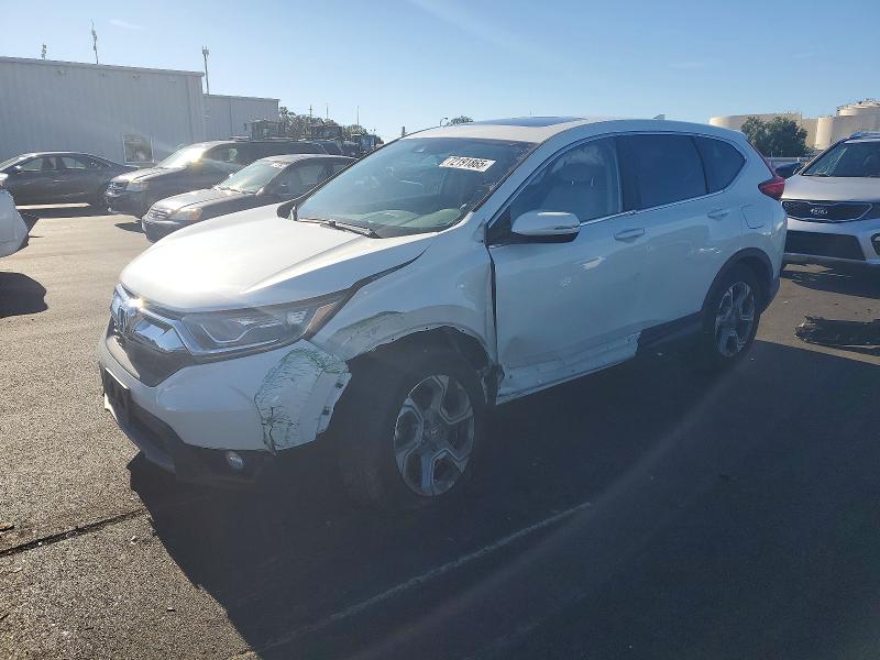 2018 HONDA CR-V — VIN 2HKRW2H56JH670111