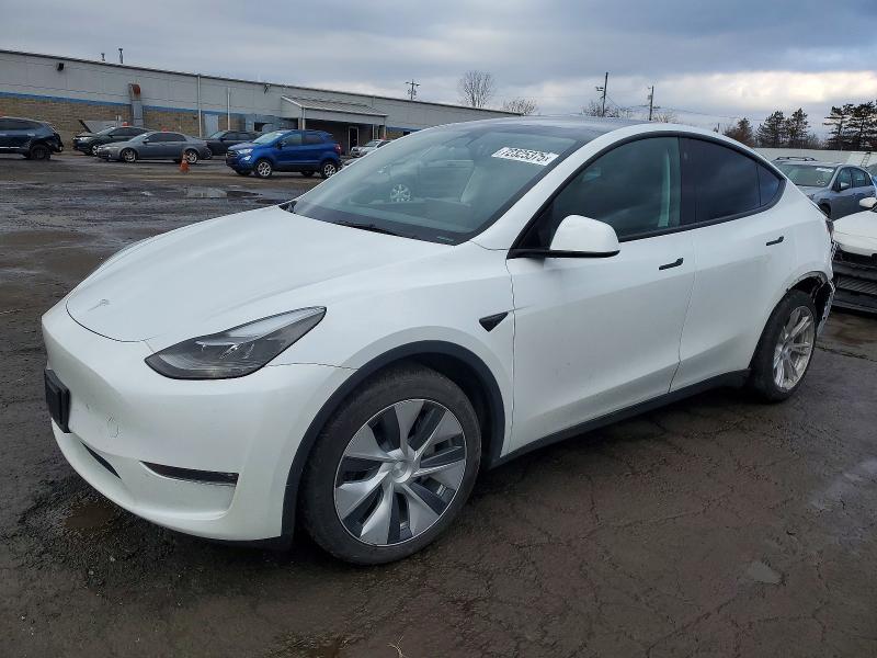 2023 TESLA MODEL Y — VIN 7SAYGAEE1PF769274