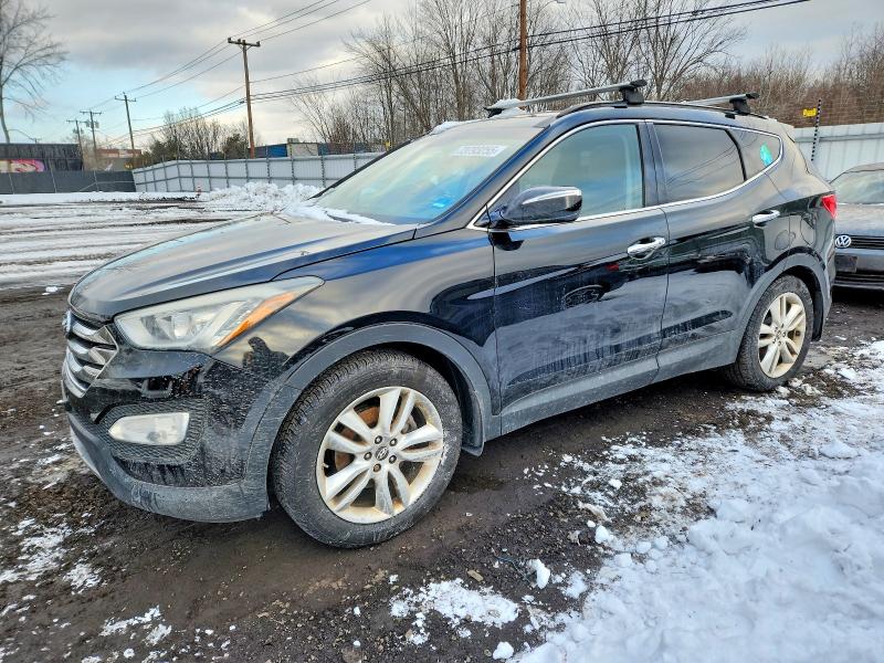 2014 HYUNDAI SANTA FE S — VIN 5XYZWDLA2EG166605