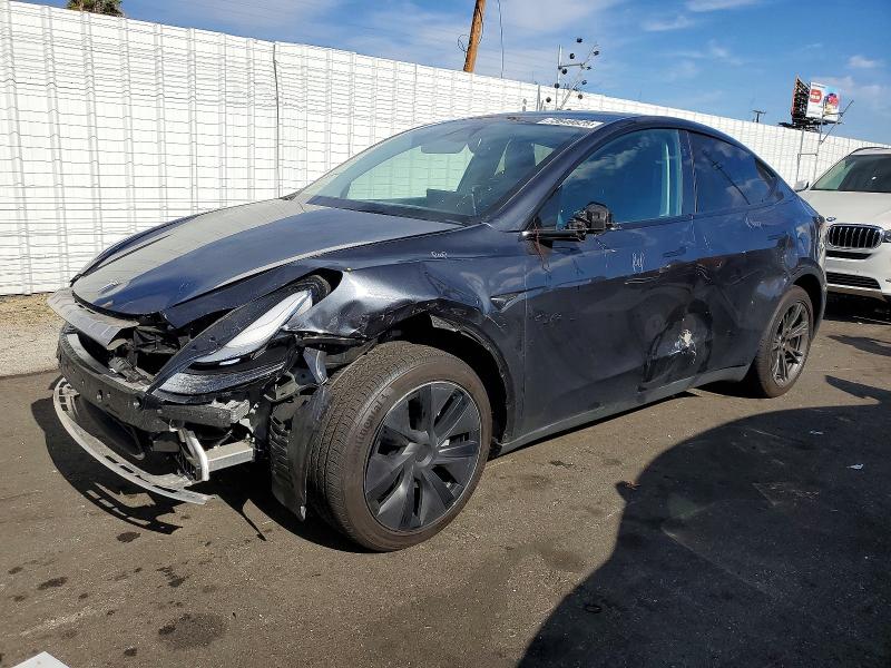 2025 TESLA MODEL Y — VIN 7SAYGDED7SF314012