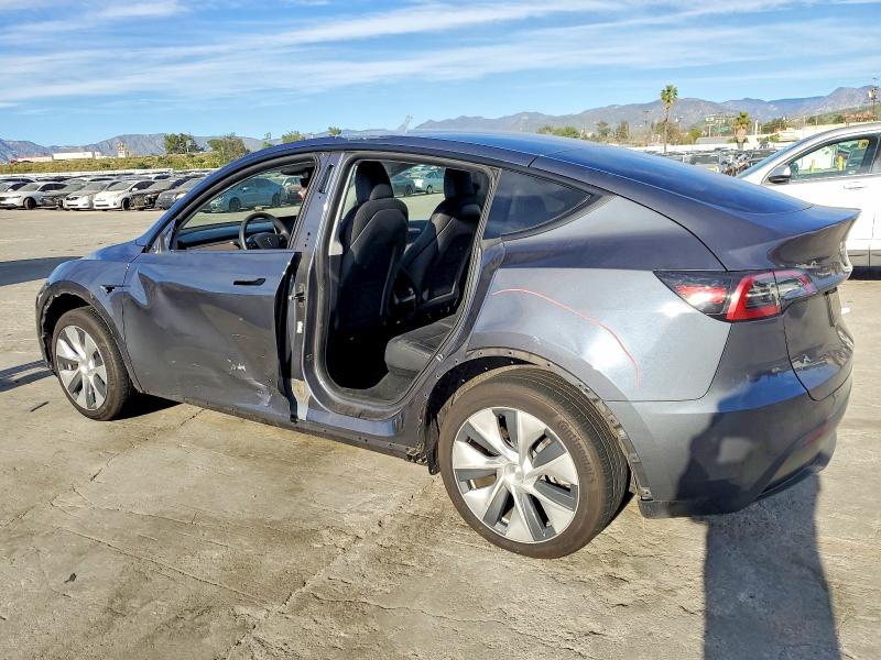 2023 TESLA MODEL Y — VIN 7SAYGDED8PF977063