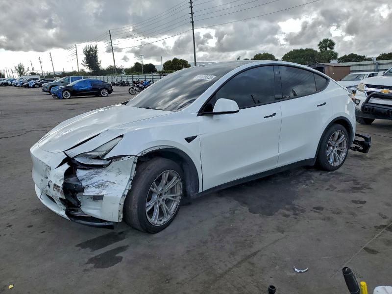 2023 TESLA MODEL Y — VIN 7SAYGAEE1PF610996