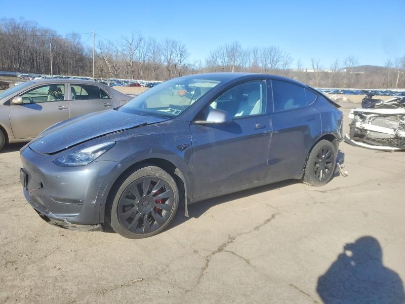 2023 TESLA MODEL Y — VIN 7SAYGDEE9PF610620